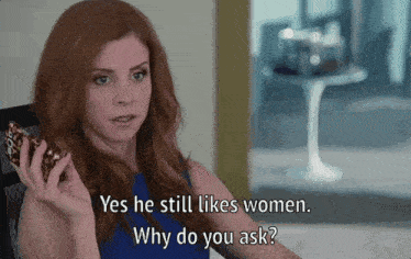 a woman is talking on a cell phone and says yes he still likes women