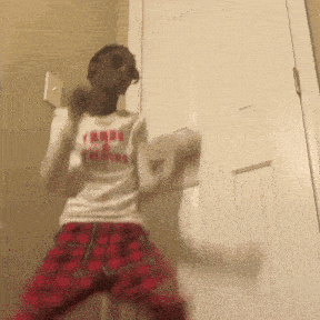 a person wearing a white shirt that says yard training on it