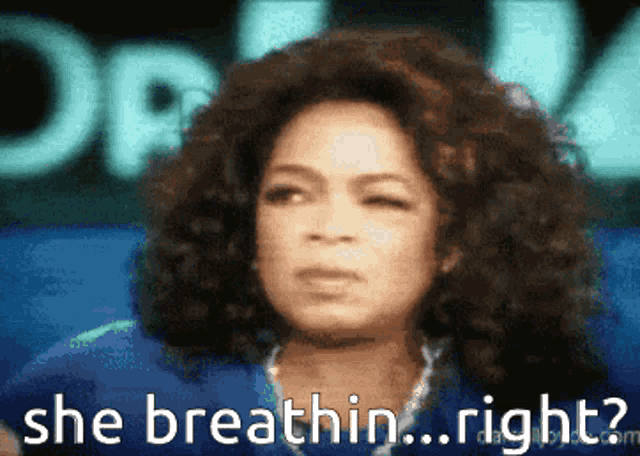 a picture of oprah winfrey with the words she breathin right