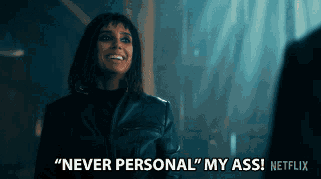 a woman in a leather jacket says " never personal " my ass