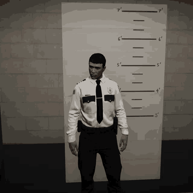 a man in a police uniform is standing in front of a ruler that shows his height at 7 '