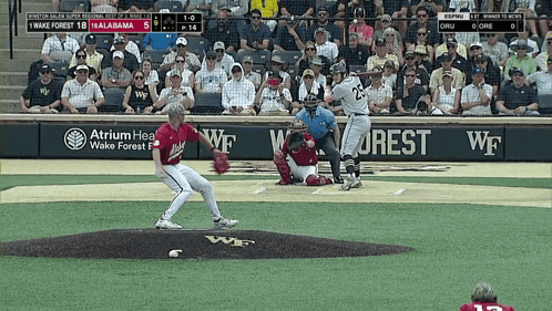 a baseball game between wake forest and alabama is being played in front of a crowd