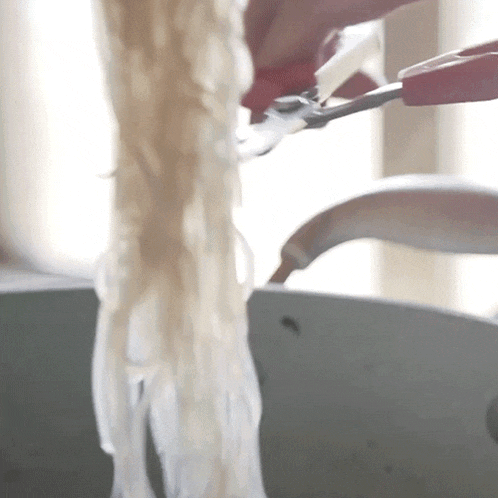 Cutting The Noodles Two Plaid Aprons GIF