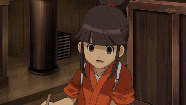 a girl in a red kimono stands in front of a wooden door that says bs japan on it