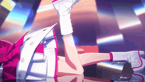 a girl in a pink and white outfit is laying down with her legs crossed