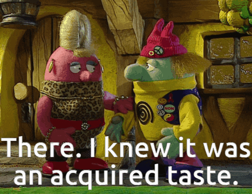 two stuffed animals are standing next to each other with the words " there i knew it was an acquired taste "