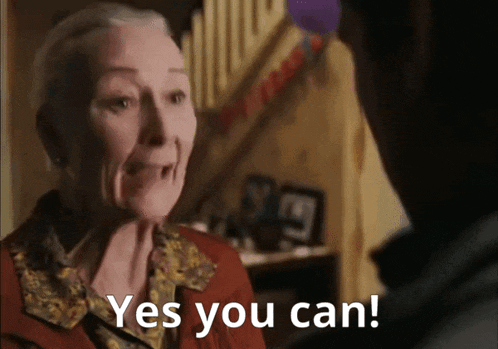 an elderly woman is talking to a man and says " yes you can "