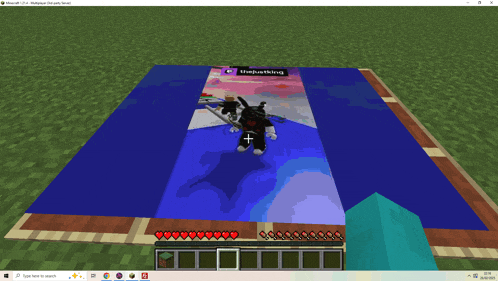 a screenshot of a minecraft game with the word theparking at the bottom