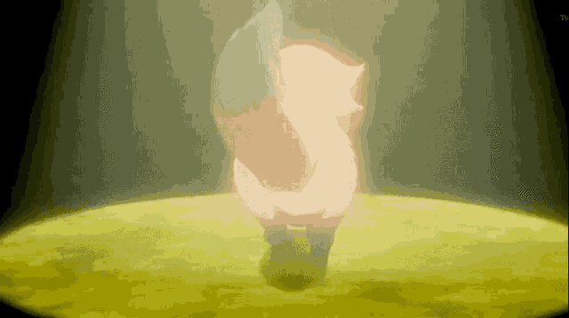a cartoon character is standing on a stage in front of a spotlight ..