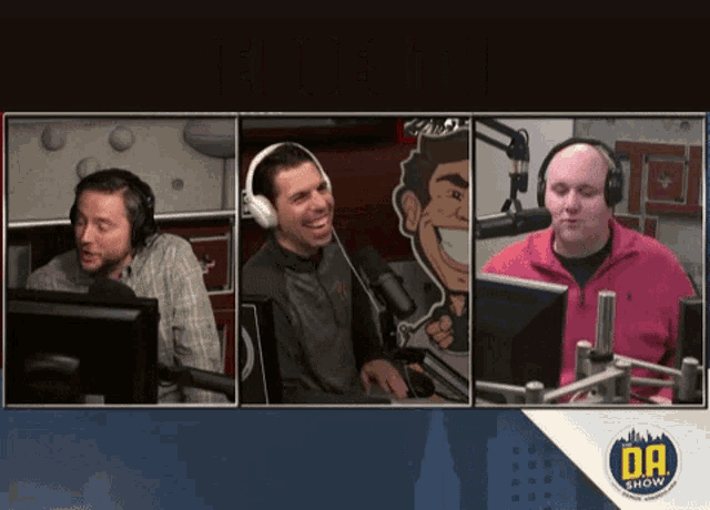 three men wearing headphones are sitting in front of a microphone and a sign that says " da show "