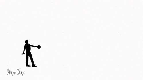 a black and white silhouette of a man holding a basketball .