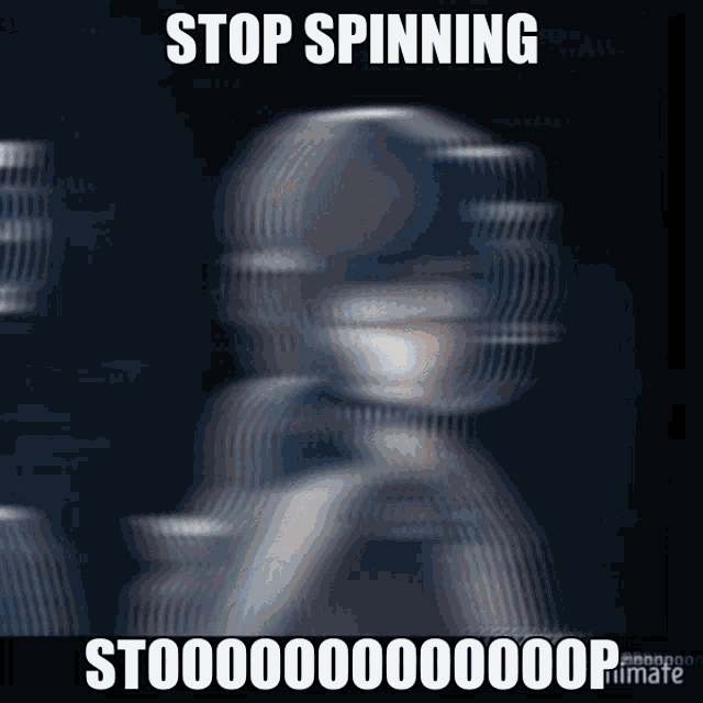a blurry picture of a person with the words " stop spinning " on top
