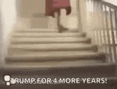 a woman is walking up a set of stairs with the words trump for 4 more years .