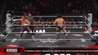 a wrestling ring with the headline liv morgan & raquel rodriguez def