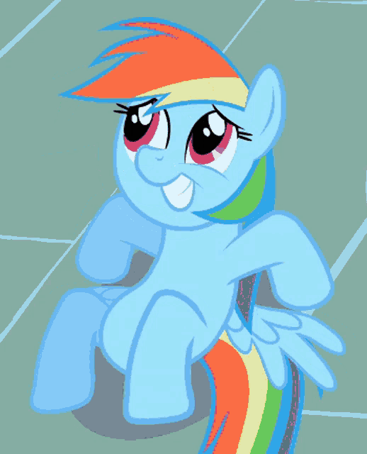 a blue pony with a rainbow tail is sitting down