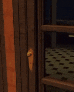 a man is looking out of a window at night .