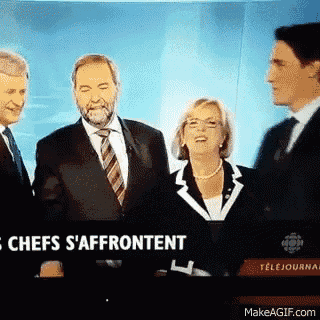 a group of people are standing in front of a sign that says chefs s'afffrontent