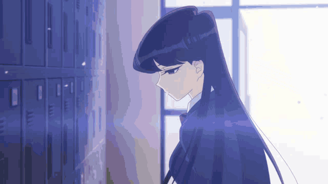 a girl with long black hair is standing next to lockers