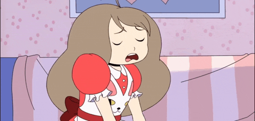 a girl in a red and white dress is yawning on a couch