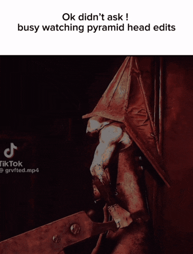 a pyramid head is holding a pair of scissors in his hand