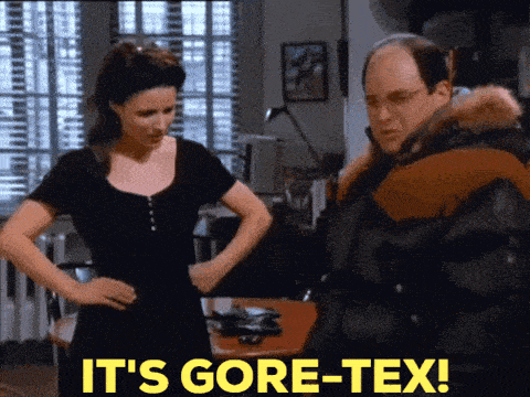 a man and a woman standing next to each other with the words it 's gore-tex written in yellow