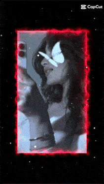 a woman with a butterfly on her eye is taking a selfie with her phone
