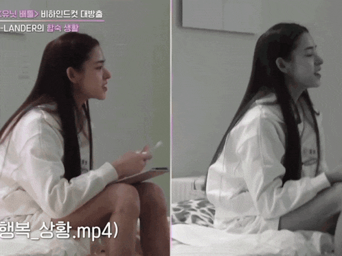 a woman is sitting on a bed with a .mp4 file in the corner