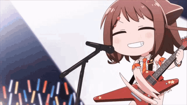a girl with a cat ear is playing a guitar and singing into a microphone
