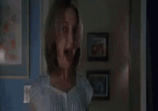 a man is talking to a woman in a doorway and says `` i can 't stop cumming ! ''