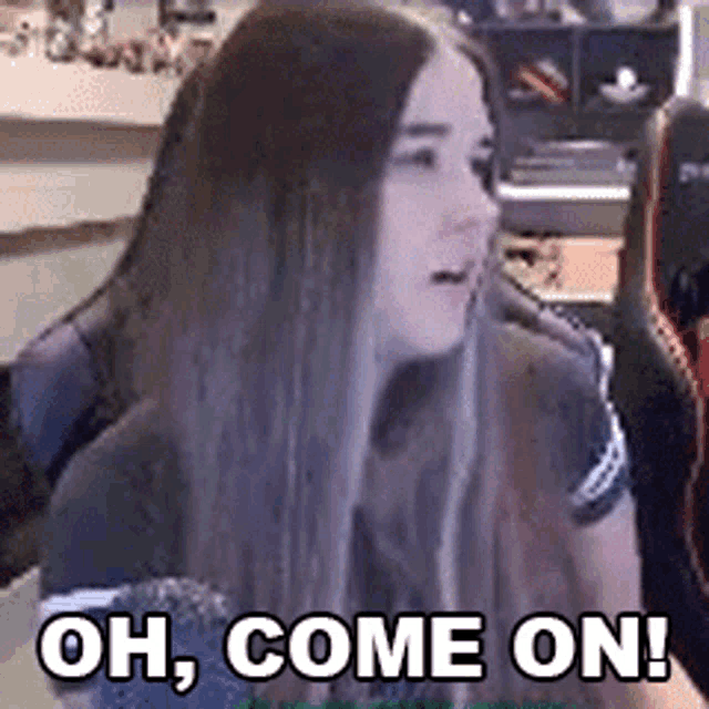 a woman with long hair is sitting in a chair with the words `` oh , come on ! '' written on her face .