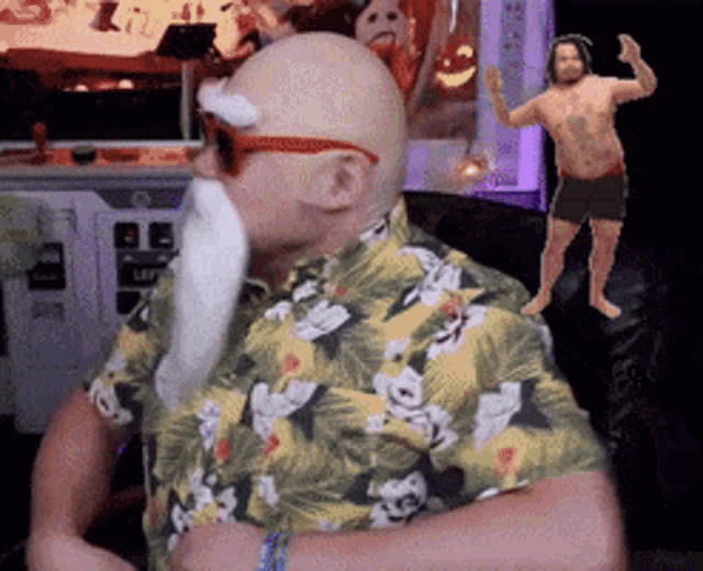 a bald man wearing a hawaiian shirt and sunglasses has a fake beard and mustache .