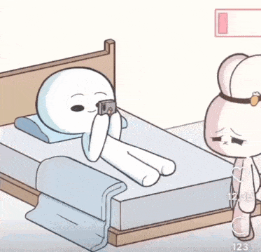 a cartoon drawing of a rabbit laying on a bed