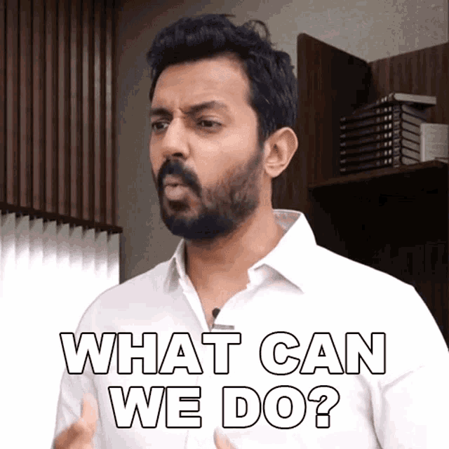 a man in a white shirt is asking what can we do