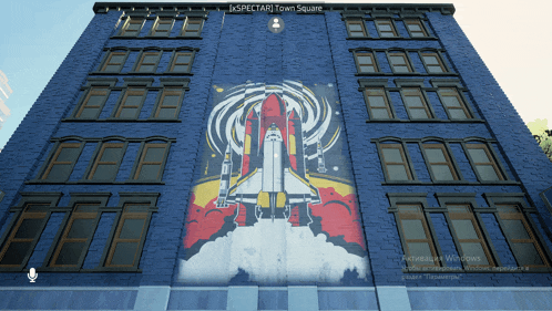 a blue building with a rocket on it and the words inspector town square