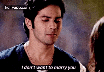 a man is telling a woman that he does not want to marry her .