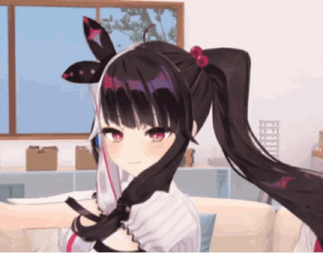 a girl with long black hair and red eyes is sitting on a couch in front of a window