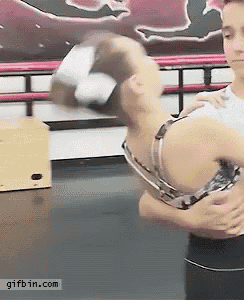 a gif from gifbin.com shows a man holding a woman