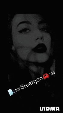 a black and white photo of a woman 's face with vidma written below it