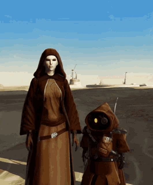 a woman in a brown robe is standing next to a small robot