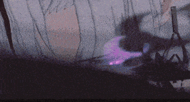 a purple light is coming out of a person 's mouth