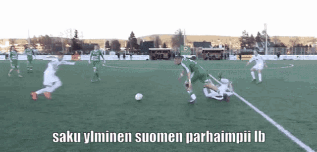 a group of soccer players on a field with the words " saku yliminen suomen parhaimii ib " on the bottom