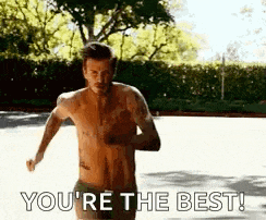a shirtless man is running on a basketball court and says `` you 're the best ! ''
