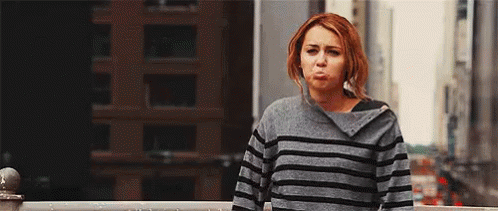 Frowny Smile - Lol GIF - Lol Miley Cyrus Romantic GIFs