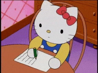 hello kitty is writing on a piece of paper with a green pencil