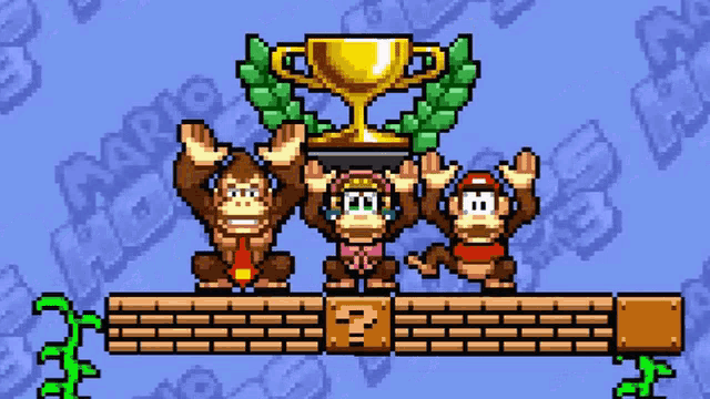 donkey kong and two other monkeys holding a trophy in a video game