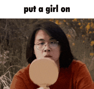 a man looking at himself in a mirror with the words put a girl on