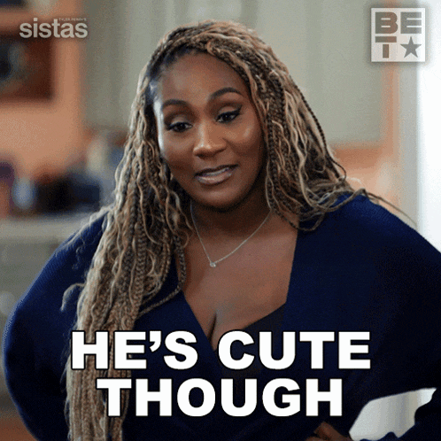 a woman says he 's cute though while wearing a blue sweater
