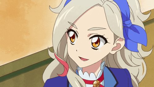 a girl with blonde hair and a blue headband