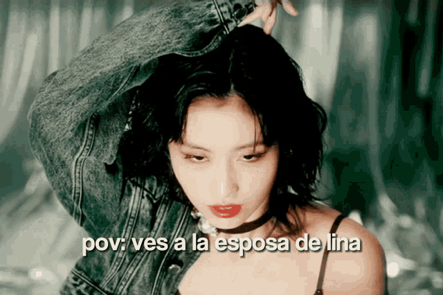 a woman in a denim jacket with the words pov ves a la esposa de lina