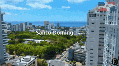 an aerial view of santo domingo with buildings and trees in the foreground